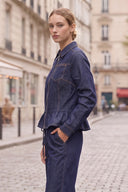 PIPER RUFFLE HEM ZIP UP DENIM JACKET