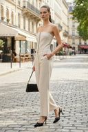 BUSTIER PLEATED STRAIGHT-LEG JUMPSUIT